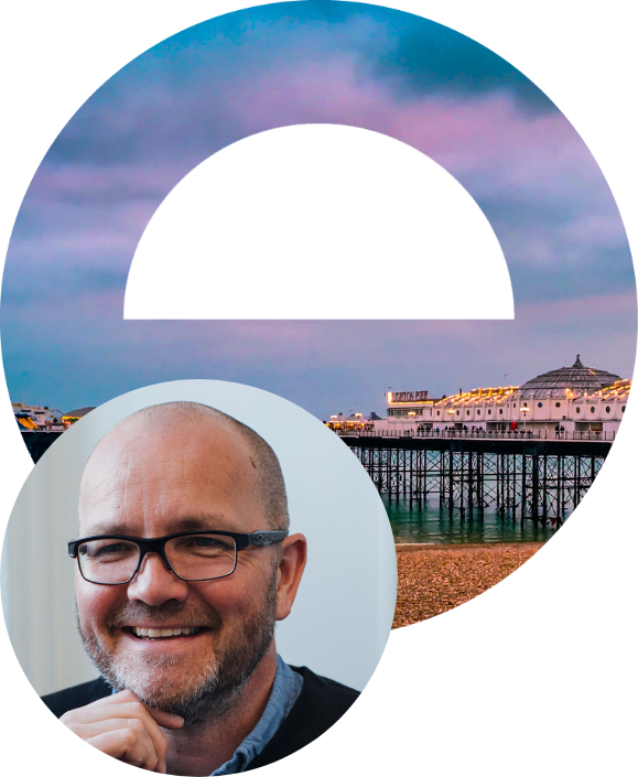 Arch logo icon with picture of Brighton pier in it, inset circle portrait of CEO Gary Bishop